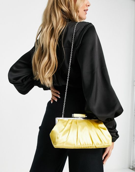 https://images.asos-media.com/products/true-decadence-exclusive-clutch-bag-in-ruched-satin/22332103-4?$n_550w$&wid=550&fit=constrain