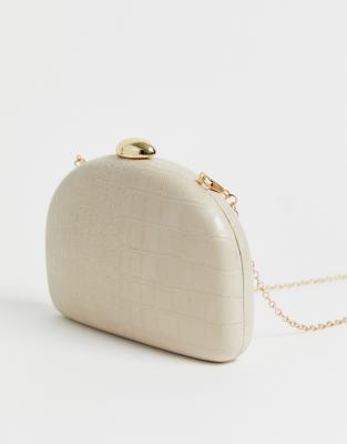 True Decadence Exclusive half moon cross body bag in cream mock croc-Pink