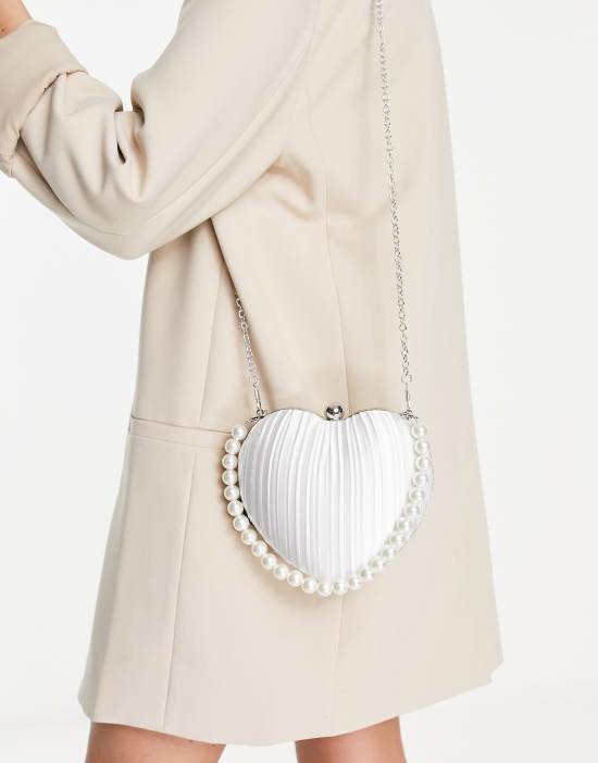https://images.asos-media.com/products/true-decadence-exclusive-heart-clutch-bag-in-off-white-satin-with-faux-pearl-handle/201733684-3?$n_550w$&wid=550&fit=constrain