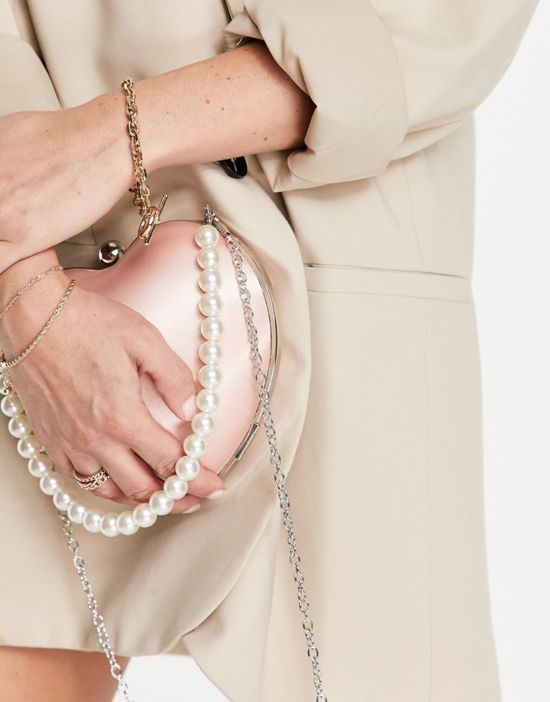 https://images.asos-media.com/products/true-decadence-exclusive-heart-clutch-bag-in-pink-satin-with-pearl-handle/203069224-3?$n_550w$&wid=550&fit=constrain