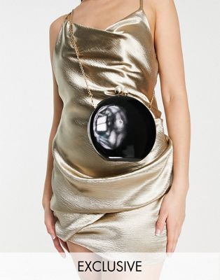 True Decadence exclusive sphere clutch with pearl clasp in black patent
