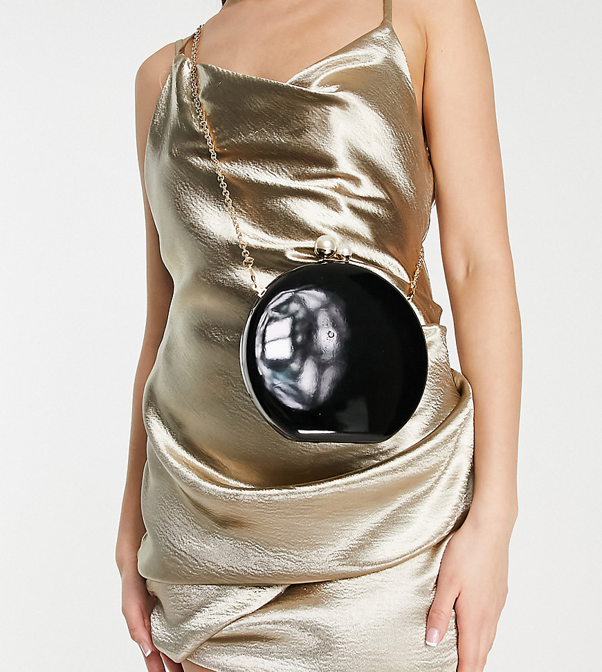 True Decadence Exclusive sphere clutch with pearl clasp in black patent
