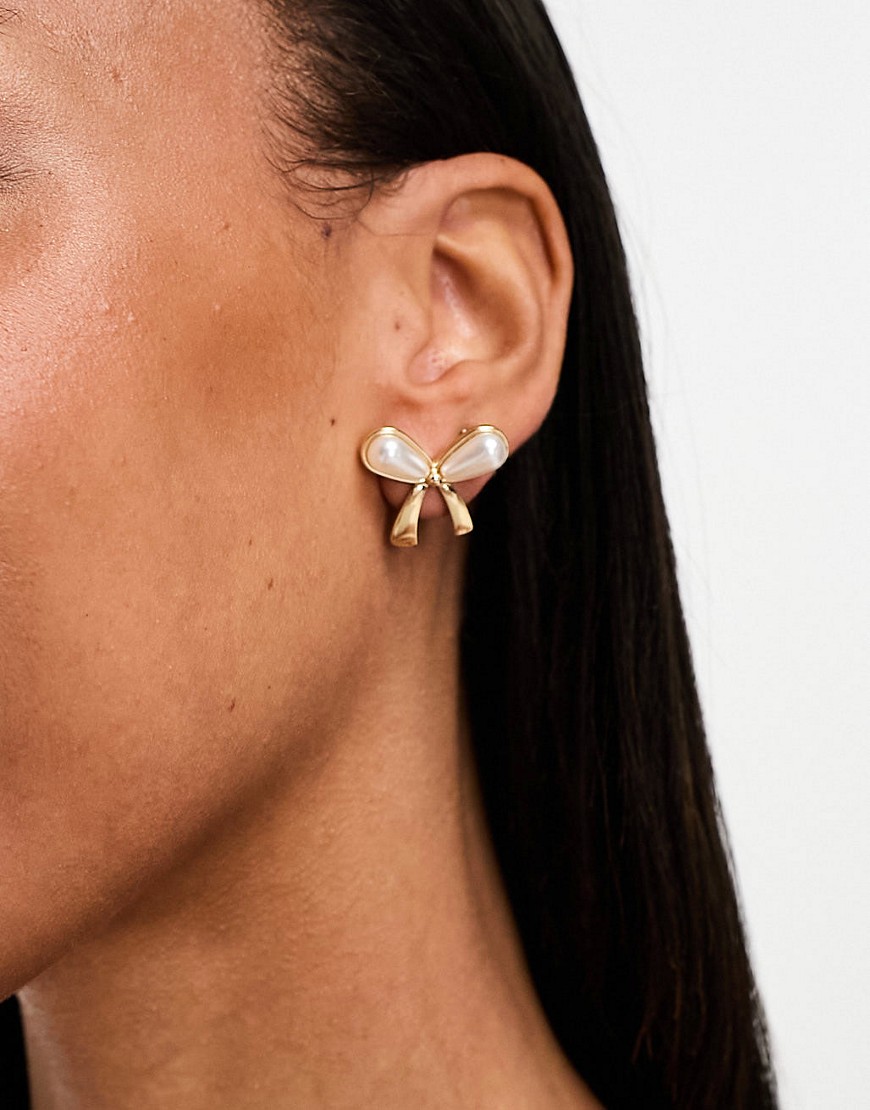 True Decadence faux pearl bow stud earrings in gold