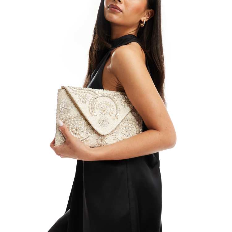 Cream gold clutch bag best sale