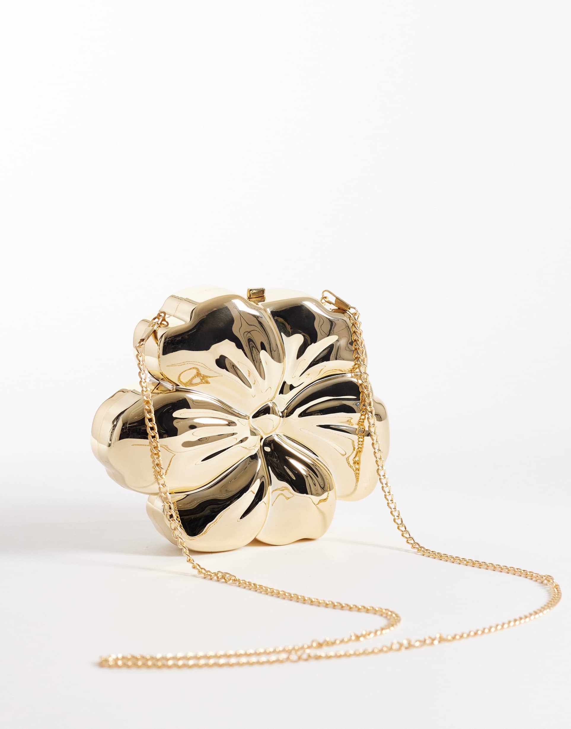 true decadence flower shaped shoulder bag in gold metal