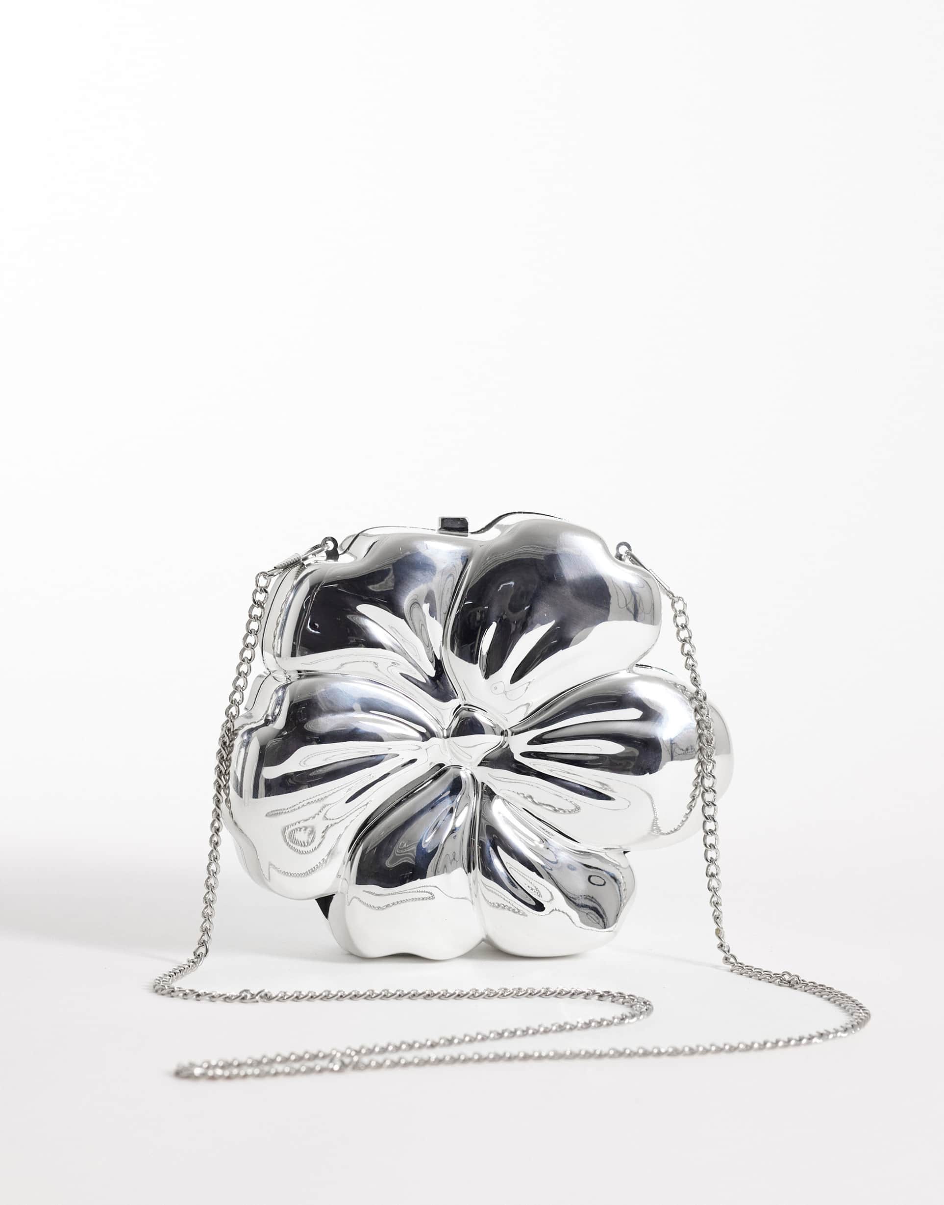 true decadence flower shaped shoulder bag in silver metal