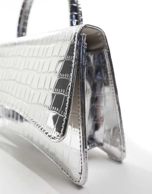True Decadence glitter clutch bag in silver croc ASOS