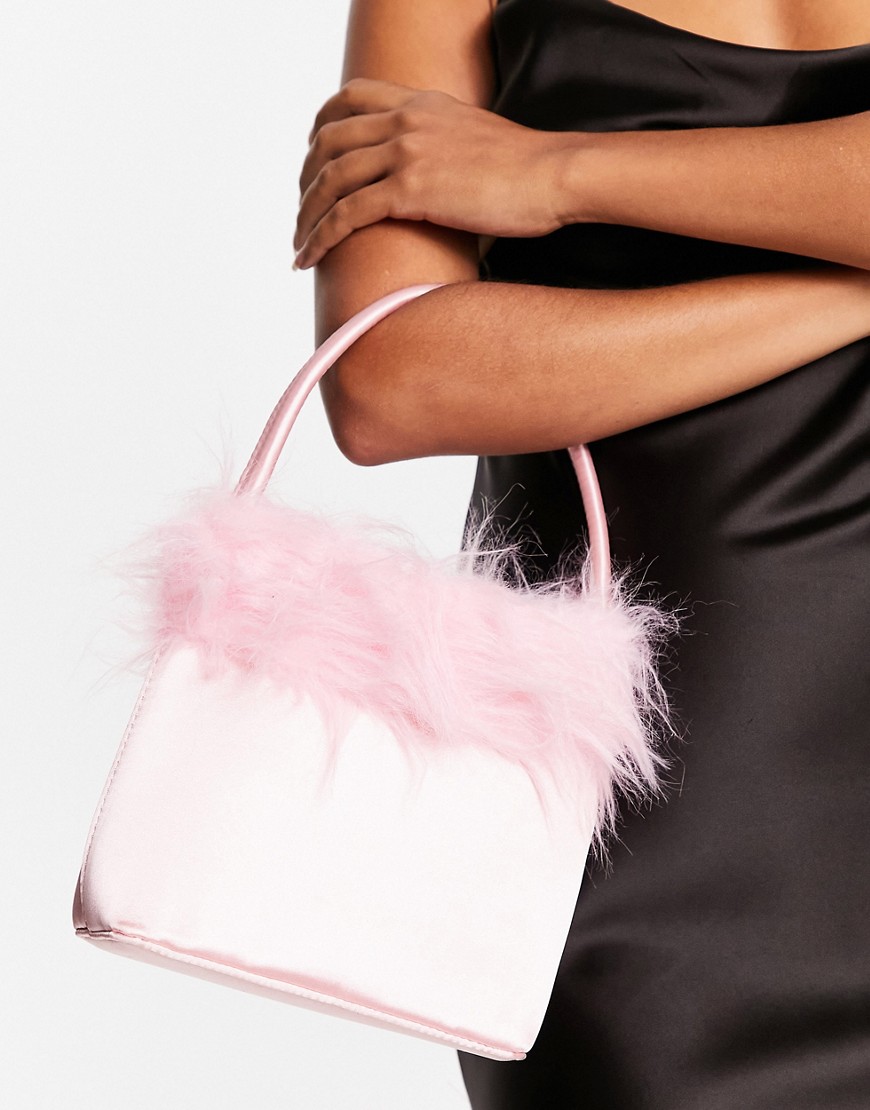 True Decadence handle grab bag in pink satin with fluffy faux fur trim