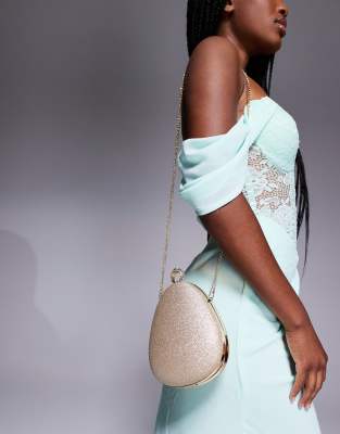 hard clutch bag with crossbody strap in gold glitter-pink