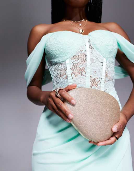 True Decadence - Hård clutch-taske med crossbody-strop i guldfarvet glimmer, 3 af 4