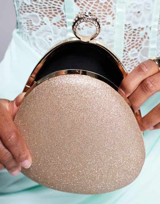 True Decadence - Hård clutch-taske med crossbody-strop i guldfarvet glimmer, 4 af 4