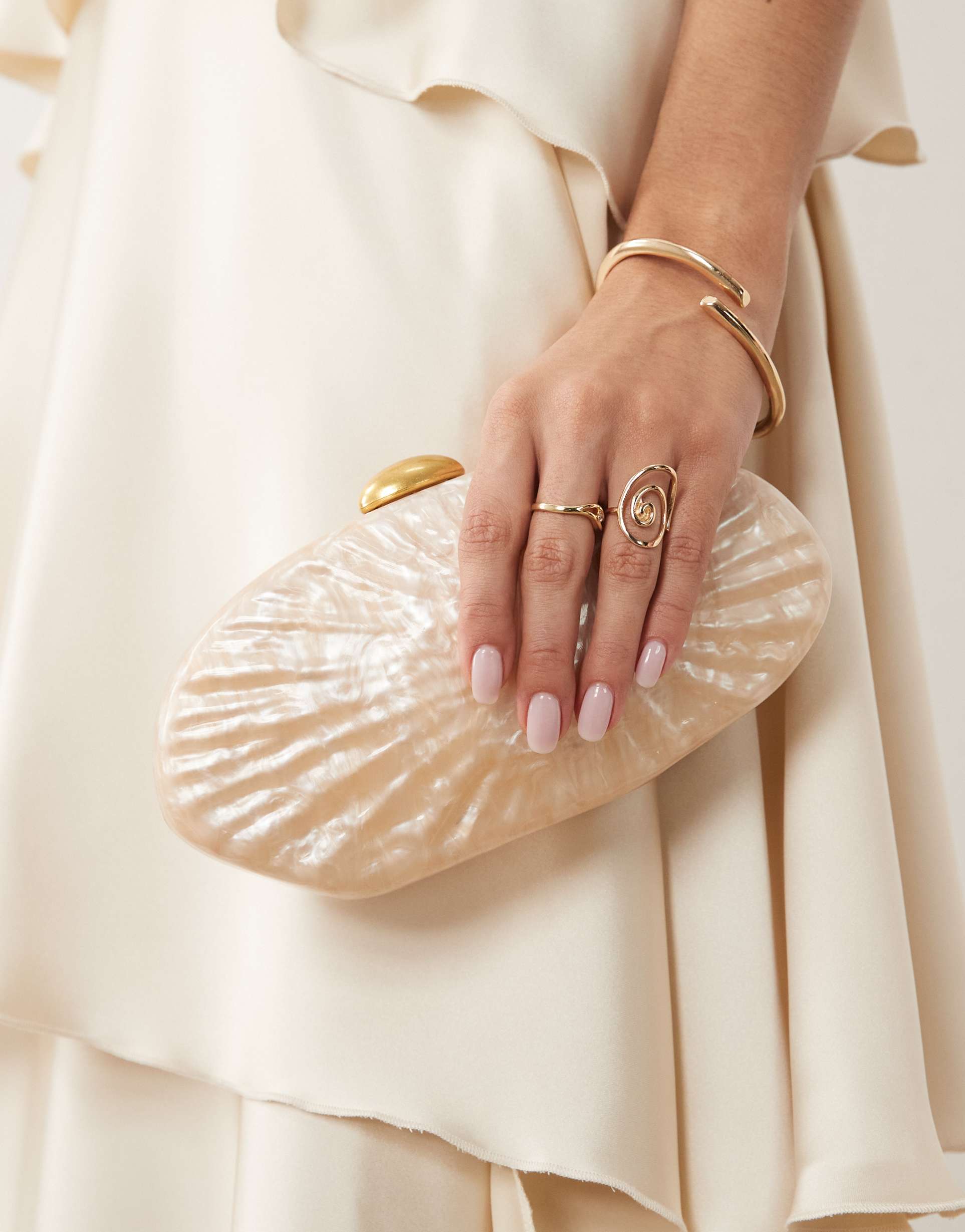 true decadence hard molten chrome clutch bag in cream