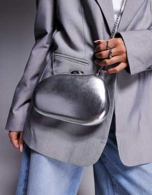 True Decadence True Decadence hard molten clutch bag with detachable crossbody strap in silver