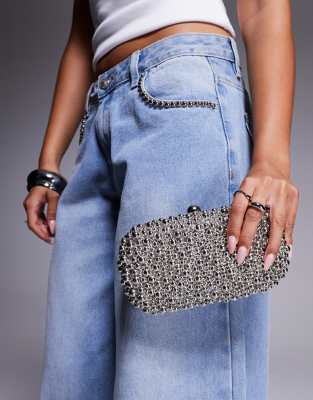 True Decadence - Hartschalen-Clutch in Silber mit Perlenbesatz