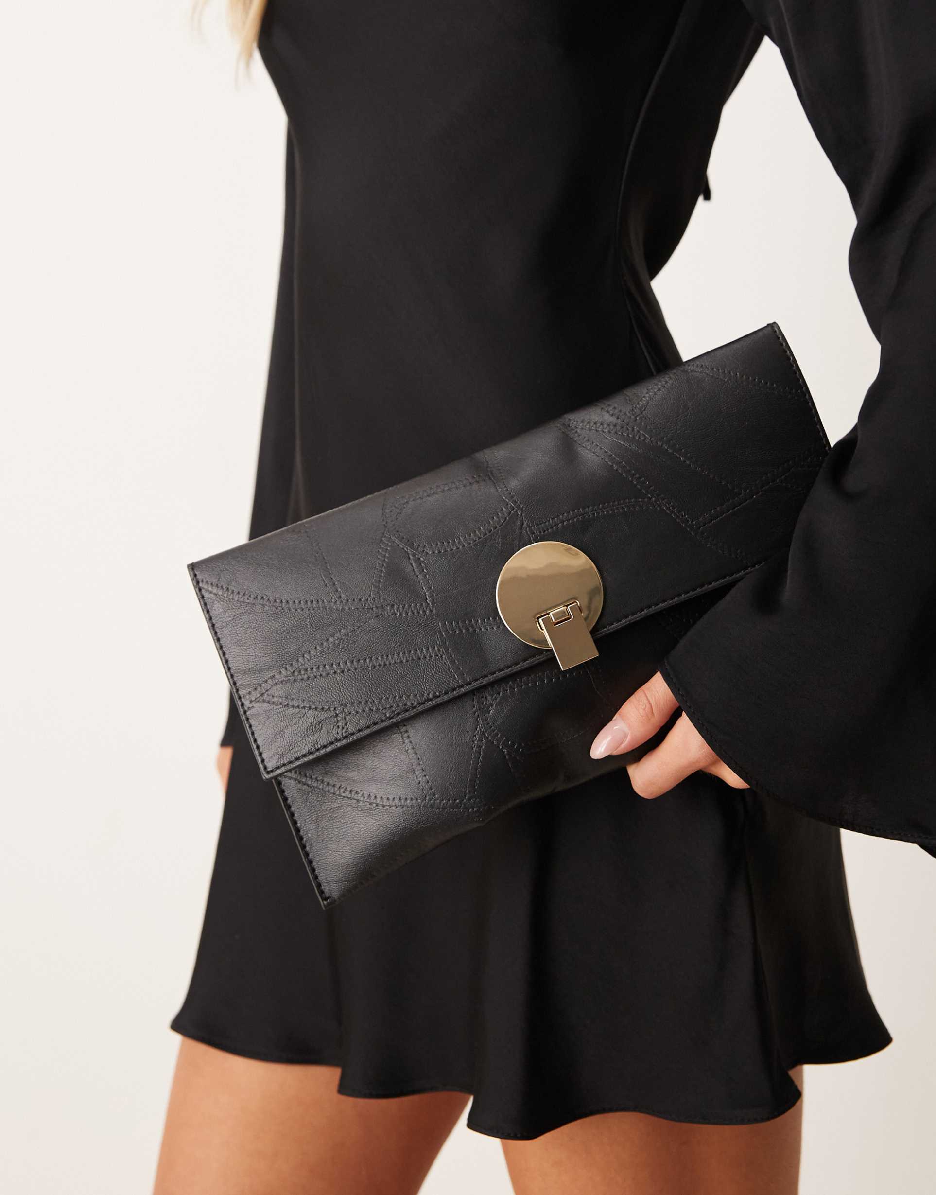 true decadence heart detail clutch purse in black