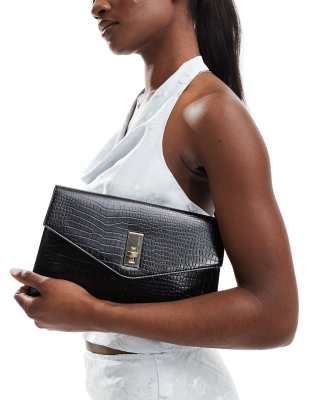 True Decadence - Klassische Clutch-Tasche in Kroko-Schwarz