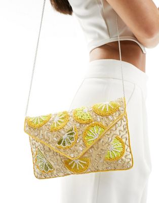 True Decadence lemon embellished envelope clutch bag in gold - ASOS Price Checker