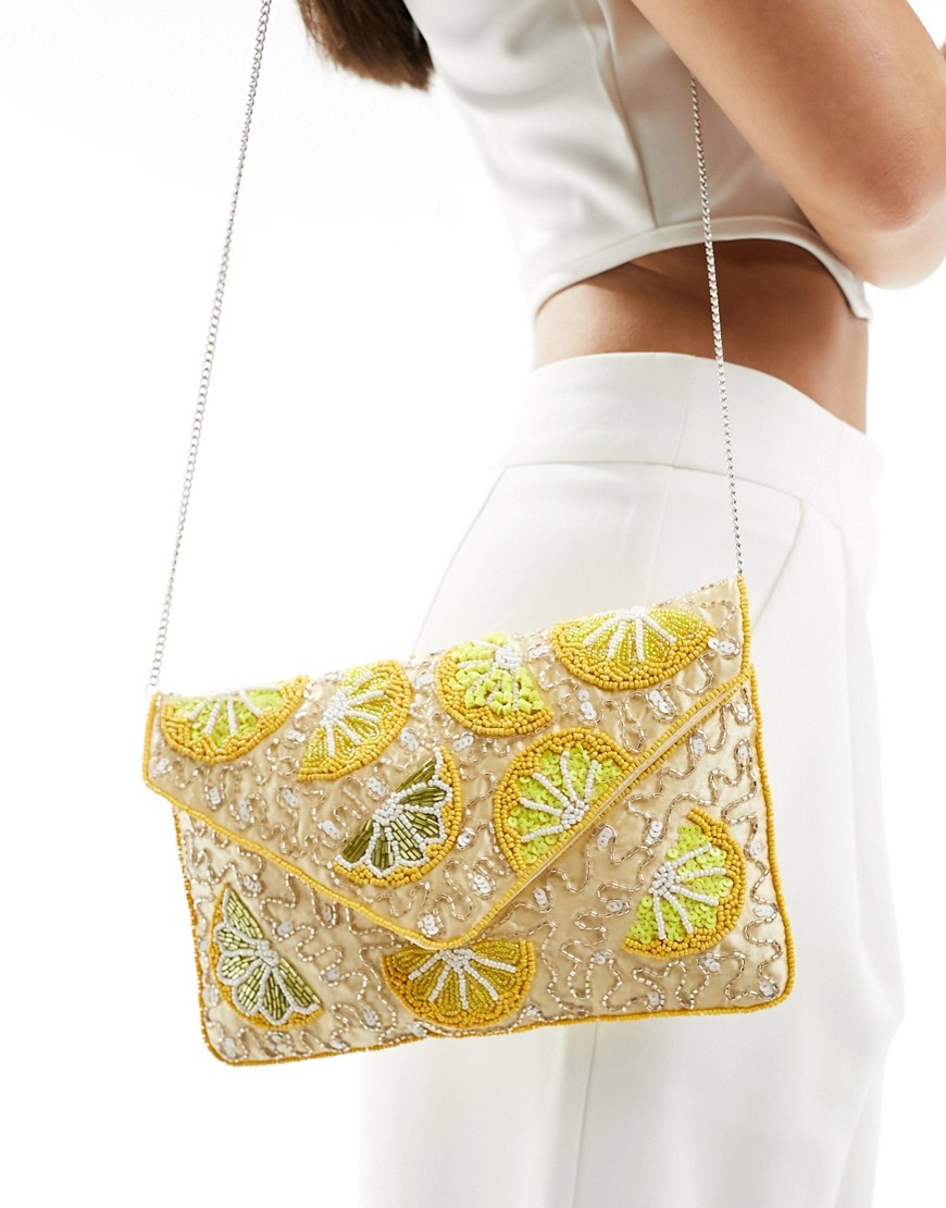 True Decadence lemon embellished envelope clutch bag in gold