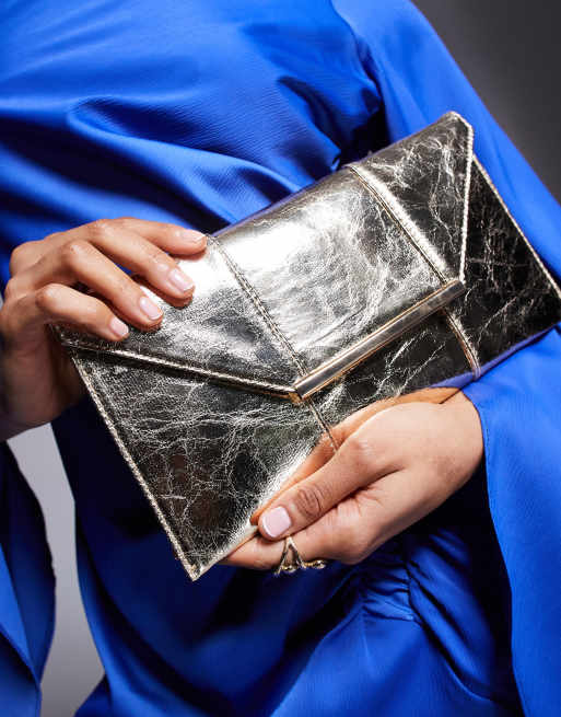 True Decadence metallic envelope clutch bag in gold ASOS