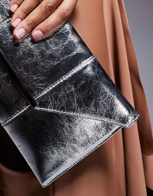 True Decadence metallic envelope clutch bag in silver ASOS