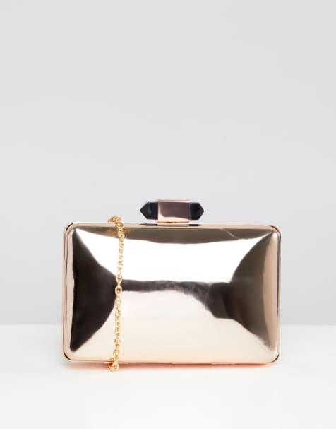 True Decadence - Metallic vierkante clutch in roségoud