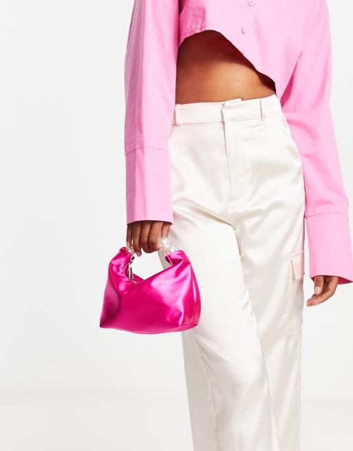 True Decadence mini grab bag in pink satin with faux pearl