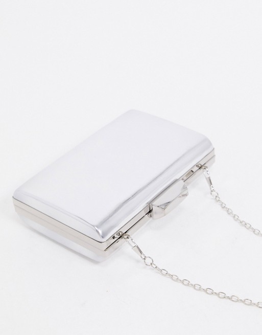 True Decadence mirrored clutch bag with detachable strap in silver