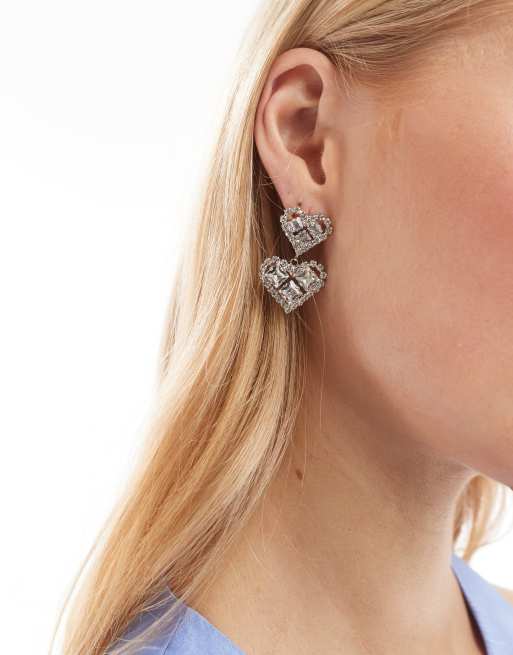 True Decadence - Orecchini argentati con cristalli e design con cuori doppi