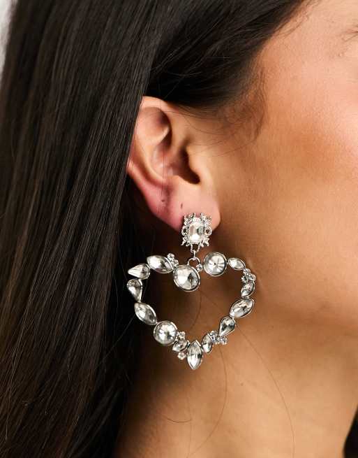 True Decadence - Orecchini color argento con cuori con cristalli