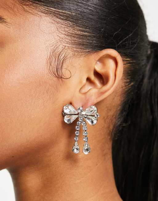 True Decadence - Orecchini pendenti a farfalla color argento con cristalli 
