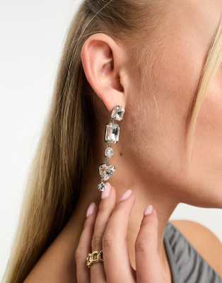 True Decadence - Orecchini pendenti color argento con cuori e pietre