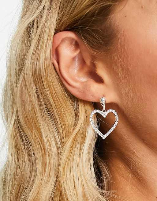 True Decadence - Orecchini pendenti con cuori con cristalli, colore argento