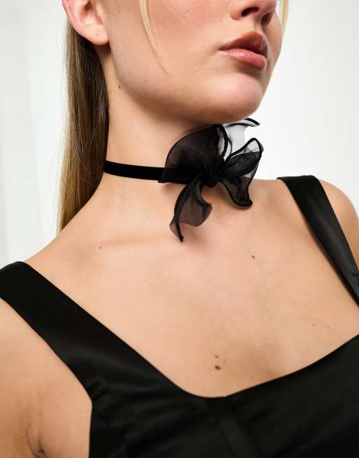 Black bow choker best sale necklace