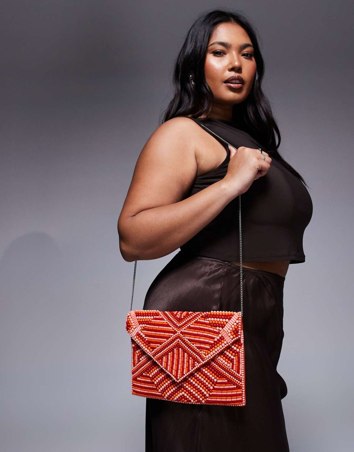 True Decadence patterned beaded envelope clutch bag in red