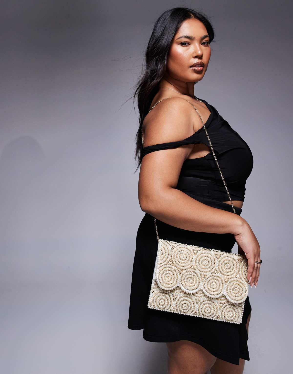 True Decadence patterned sequin envelope clutch bag in white