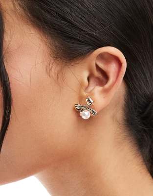 True Decadence True Decadence pearl and bow stud earrings in gold