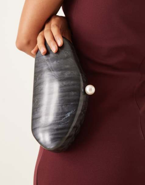True Decadence pearl and resin clutch bag in black - view 1