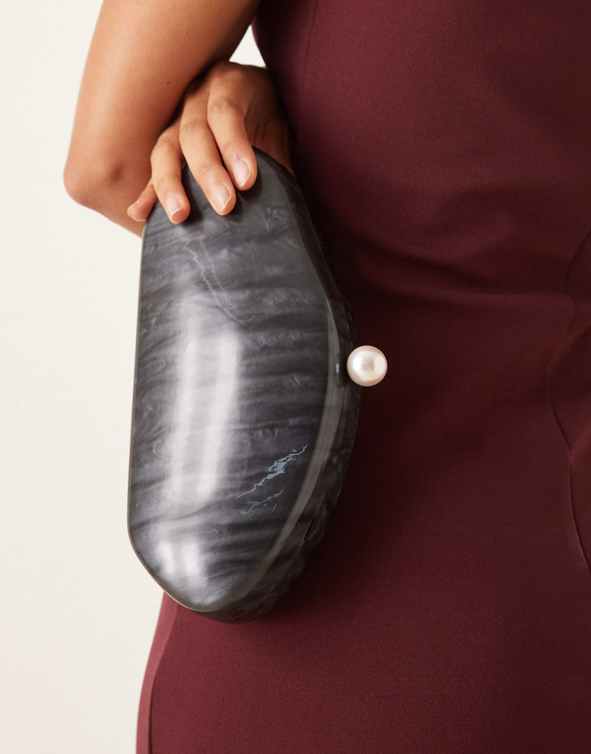 true decadence pearl and resin clutch bag in black