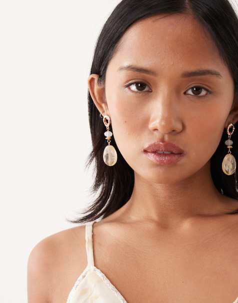 True Decadence pearl and resin drop earrings in gold - view 1