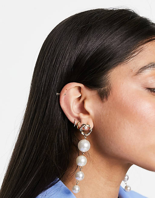 True Decadence pearl drop earrings in gold | ASOS