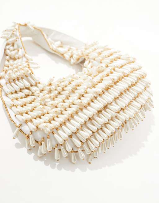 True Decadence pearl drop embellished shoulder bag in cream