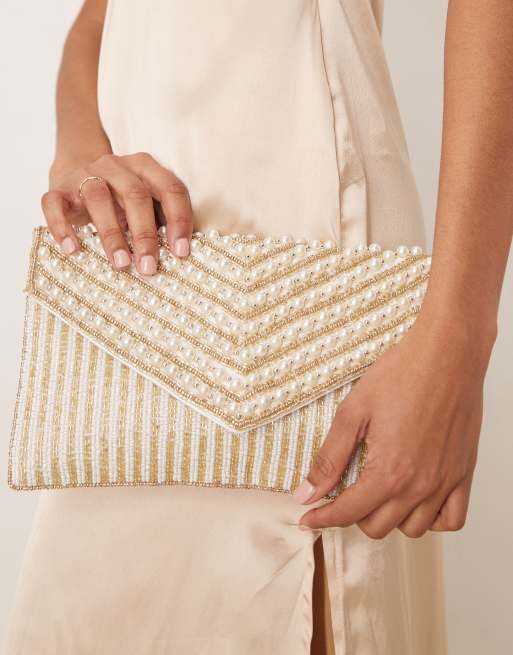 True Decadence Pochette a busta oro a righe con perline e perle