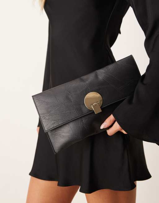 True Decadence - Pochette nera con dettaglio a cuore 
