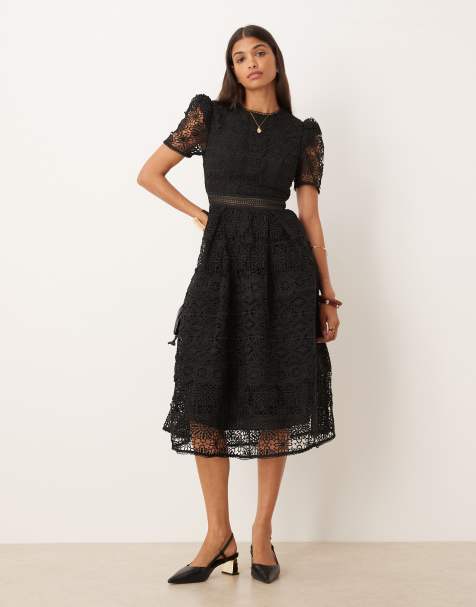 True Decadence Puff sleeve midi dress in black
