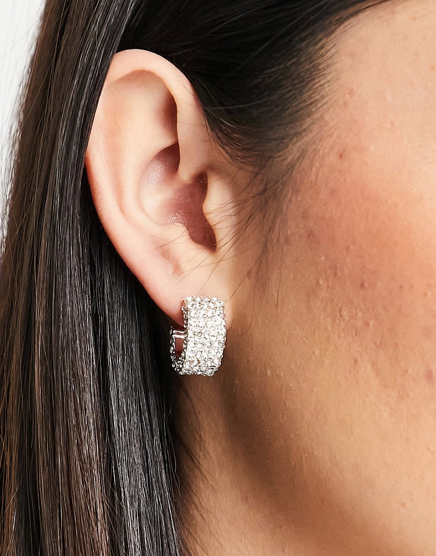 True Decadence rhinestone encrusted chunky huggy hoop earrings in silver