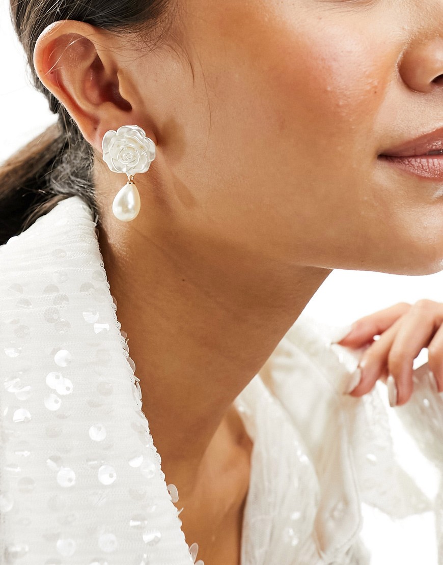 True Decadence rose stud earrings with pearl drop in white