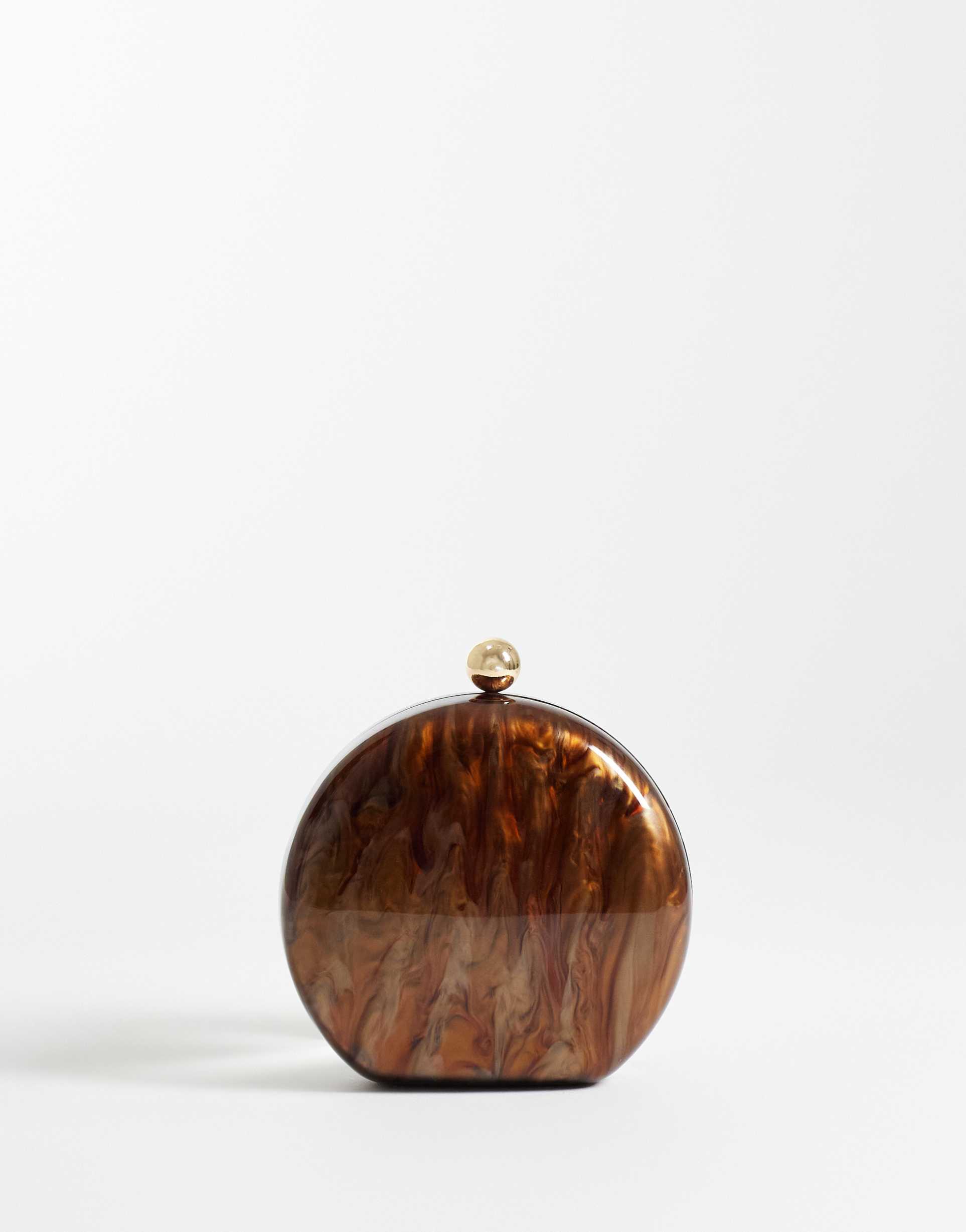 true decadence round hard shell marble clutch bag in brown