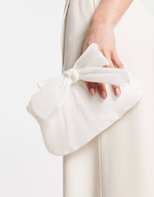 Bow store clutch bag