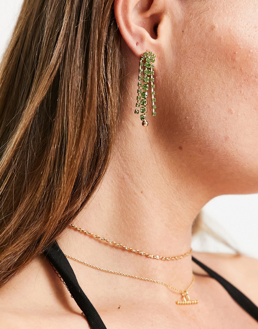 True Decadence statement waterfall earrings in gold with green crystal