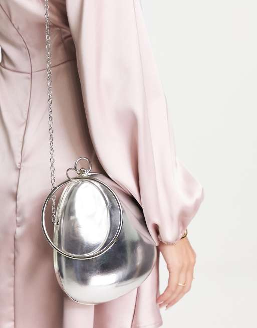 True Decadence structured grab bag in silver mirror with ring handle